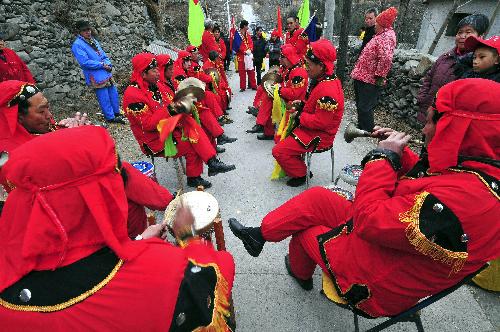 Happy villagers celebrate Lunar New Year